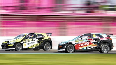 Timur Timerzyanov, left, and Reinis Nitiss race in the World RX Q1 during the FIA World RallyCross Championship 2019 Abu Dhabi.