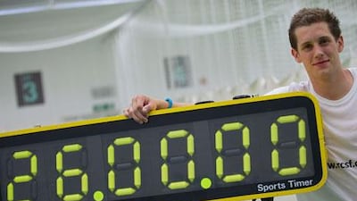 Alby Shale poses next to a timer after batting for 26 hours at the Kennigton Oval cricket club in London, on Tuesday. The world record attempt was in aid of the Rwanda Cricket Stadium Foundation. Andrew Cowie / AFP