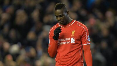 Liverpool's Mario Balotelli reacts during his side's Premier League match on Monday agains Swansea City. Peter Powell / EPA