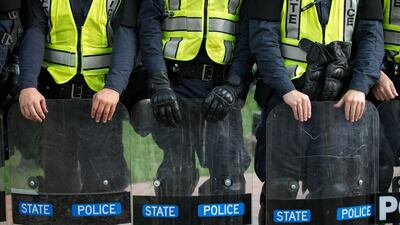 Police during a rally on the campus of the University of Virginia one year after a violent white-nationalist rally. AFP
