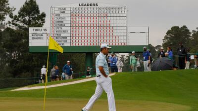 Japan's Hideki Matsuyama prepares to hit his birdie putt on the 17th green. Reuters