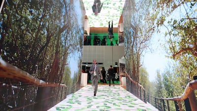 Reflecting on the Visit Sharjah pavilion at the Arabian Travel Market, at Dubai World Trade Centre. All photos: Chris Whiteoak / The National