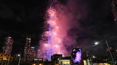 Fireworks light up the sky around the Burj Khalifa during New Year celebrations in Dubai early on January 1, 2026. (Photo by Fadel SENNA / AFP)