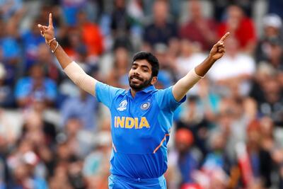 Cricket - ICC Cricket World Cup Semi Final - India v New Zealand - Old Trafford, Manchester, Britain - July 9, 2019 India's Jasprit Bumrah celebrates taking the wicket of New Zealand's Martin Guptill Action Images via Reuters/Jason Cairnduff