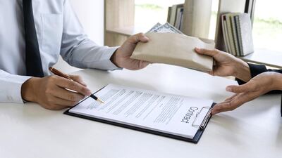 Historically, the banking and financial services industries and professional services companies have awarded lucrative bonuses. Photo: The National