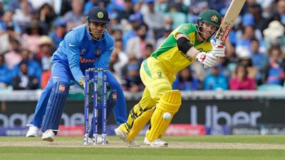 David Warner made a half century for Australia against India but not before surviving when on one. Getty Images