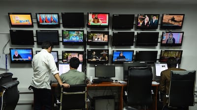 Afghan reporters of Tolo News work in the newsroom at Tolo TV station in Kabul. Journalists faced growing dangers of being targeted for killing for their work in 2018. AFP