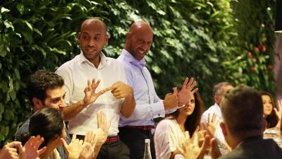 Wael, left, and Feras Al Moubayed, deaf brothers, taking free sign language class at the Pavilion in Downtown Dubai. Pawan Singh / The National