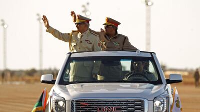 Field Marshal Khalifa Haftar, left, at a military parade in the eastern city of Benghazi on May 7, 2018. His Libyan National Army controls the east of Libya. AFP