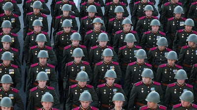 Russian soldiers march in columns. Reuters
