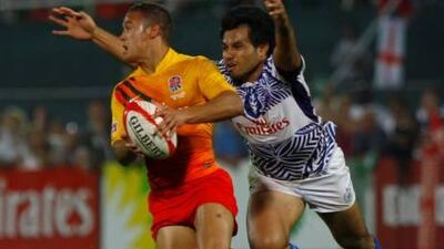 Dan Norton, the England player, attempts to escape a tackle during last night’s win over Samoa.