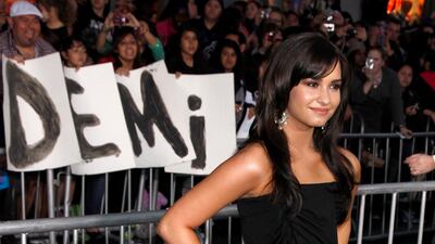 Demi Lovato, in Shoshanna, arrives at the premiere of 'Jonas Brothers: The 3D Concert Experience' in Hollywood, California, on February 24, 2009. EPA
