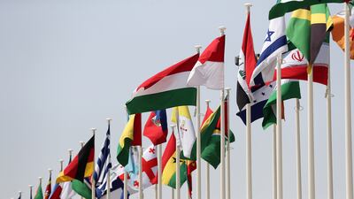 Flags of different countries placed at the Expo 2020 site in Dubai. Pawan Singh / The National