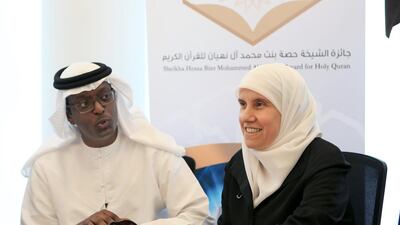 Hani Zubaidi and Hoda Habch announcing the Sheikha Hessa bin Mohammed Al Nayhan Quran contest at Al Shuhub School in Abu Dhabi. Ravindranath K / The National