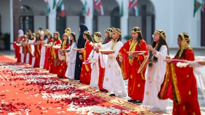 Children welcome the guests to Sakhir Palace