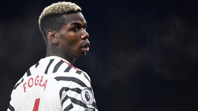 Manchester United's Paul Pogba reacts during the English Premier League soccer match between Burnley and Manchester United in Burnley, England. AP