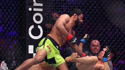 Hadi Omar Al Hussaini pins Ruel Panales to the mat at the Coca Cola Arena in Dubai