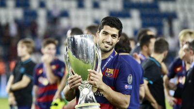 Luis Suarez joins Cristiano Ronaldo and Barcelona teammate Lionel Messi in the running for Uefa Best Player. Zurab Kurtskidze / EPA