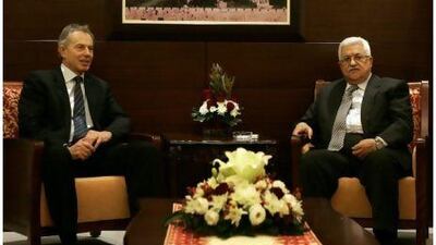 The former British prime minister and international mideast envoy Tony Blair, left, meets Mahmoud Abbas, the Palestinian president, in the West Bank city of Ramallah on Monday.