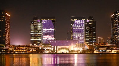 The colour purple was projected on to the facade of buildings at the Abu Dhabi Global Market.