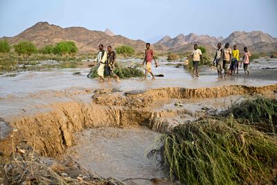 A damaged road after the collapse of the Arbaat Dam, 40km north of Port Sudan, following heavy rain. AFP