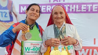 Rambai Maan displays her gold medals. Photo: The Maan family