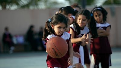 Saudi and expatriate girls practice basketball at a private sports club in Jeddah, Saudi Arabia. Hasan Jamali / AP