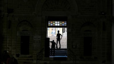 Palestinians leave Al-Omari mosque. EPA
