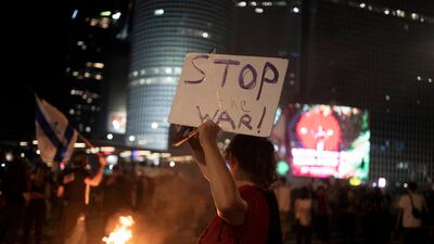 A protester with a message at a demonstration against Israeli Prime Minister Benjamin Netanyahu's government in Tel Aviv. Calls for the release of hostages held in the Gaza Strip by Hamas militant group are increasing. AP