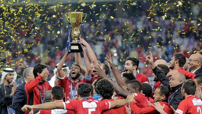 Al Ahly's players celebrate winning the Egyptian Super Cup football match between Al-Ahly and Al Masry at Hazza bin Zayed Stadium, City of al-Ain, Abu Dhabi. Mahmoud Khaled/ EPA