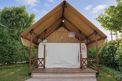 The exterior of the two-storey T-Rex Glamping cabin. Shazia Ahmed / The National