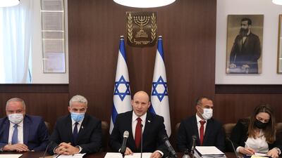Israeli Prime Minister Naftali Bennett attends a Cabinet meeting at the prime minister's office in Jerusalem.