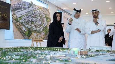 Sheikh Mohammed bin Zayed, Crown Prince of Abu Dhabi and Deputy Supreme Commander of the UAE Armed Forces (R), visits the Expo 2020 main office in Jebel Ali. He is seen with Reem Ibrahim Al Hashimi, UAE Minister of State for International Cooperation (L). Hamad Al Mansoori for The Crown Prince Court