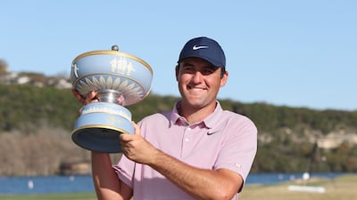 Scottie Scheffler poses with the Walter Hagen Cup after defeating Kevin Kisner in the final of the WGC-Dell Technologies Match Play. Getty