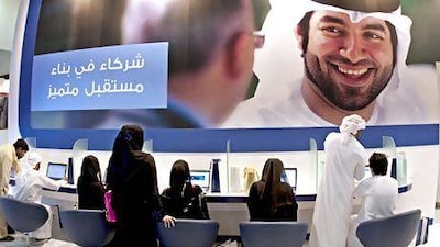 Visitors check out job opportunities at Careers UAE 2012. Ninety per cent of the 225,000 Emiratis in the workforce are employed in the public sector. Jeff Topping / The National