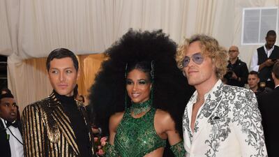 Yes, Ciara looked fabulous in emerald green and huge hair, but full marks go to designer Peter Dundas in his embellished "Elvis, the Vegas years" suit and matching shirt, perfectly complimented by the vertical black and gold stripes of their (unidentified) companion. AFP