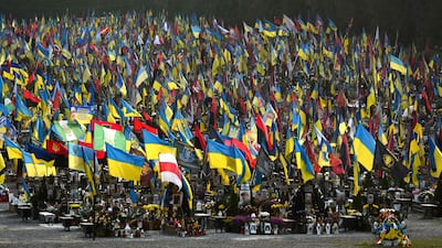 Graves of Ukrainian fallen soldiers at a cemetery in Lviv, on the Day of the Armed Forces of Ukraine, on Friday. AFP