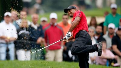 Tiger Woods hits out of the rough on the second hole during the final round of the World Golf Championships-Bridgestone Invitational at Firestone Country Club South Course on August 3, 2014 in Akron, Ohio. Gregory Shamus/Getty Images
