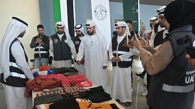 Warm clothing is prepared before being sent to Gaza as part of a winter clothing aid campaign. Wam