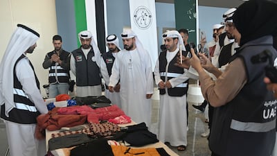 Warm clothing is prepared before being sent to Gaza as part of a winter clothing aid campaign. Wam