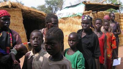 People queue for measles vaccinations by Médecins Sans Frontières in Sudan.