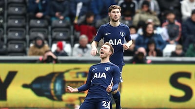 Christian Eriksen, bottom, opened the scoring for Tottenham before adding a second against Swansea as the London club advanced to the semi-finals of the FA Cup. Catherine Ivill/Getty Images