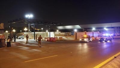 Saudi security forces stand guard outside a hotel in Riyadh where Syrian opposition groups held talks on December 10, 2015. Khalid Mohammed/AP Photo