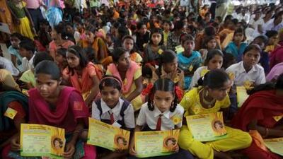 Girls hold certificates showing their new names during a renaming ceremony in Satara, India. More than 200 girls who were named Nakusa, which means unwanted in the local Marathi language, officially changed their names at the ceremony.