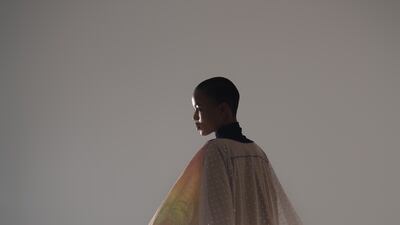 Another piece from the Artist collection, this was painted by the UAE’s Khulood Al Jabri, over a four-hour period. Here, it is worn with fringed boots by Christian Louboutin.