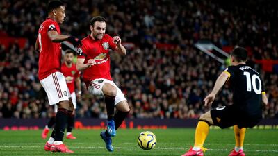 Manchester United's Anthony Martial (left) and Juan Mata. PA