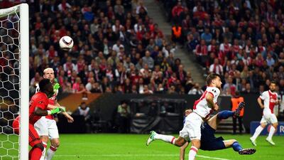 Manchester United midfielder Henrikh Mkhitaryan scores the second the final goal. Georgi Licovski / EPA