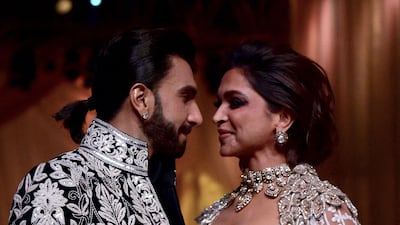 Married couple Ranveer Singh and Deepika Padukone shared a kiss on the catwalk.