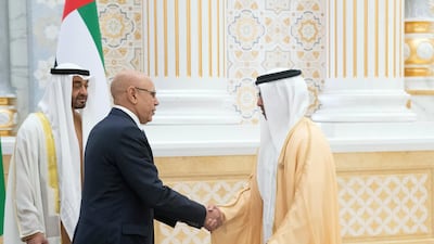 Mohamed Ghazouani, President of Mauritania, greets Sheikh Hamed bin Zayed, members of Abu Dhabi Executive Council, during an official visit reception, at Qasr Al Watan. Seen with Sheikh Mohamed bin Zayed. Hamad Al Kaabi / Ministry of Presidential Affairs