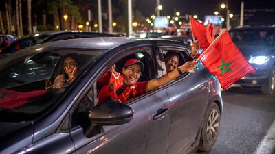 Fans wave their flags in Rabat. EPA